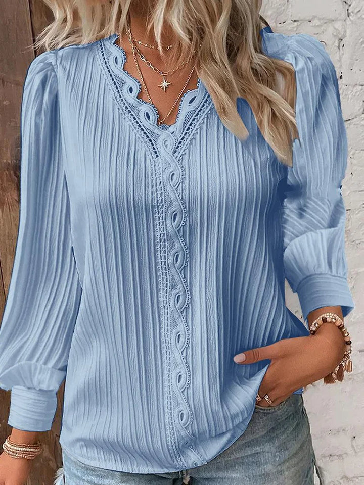 Elegant long sleeve blouse with lace details for women