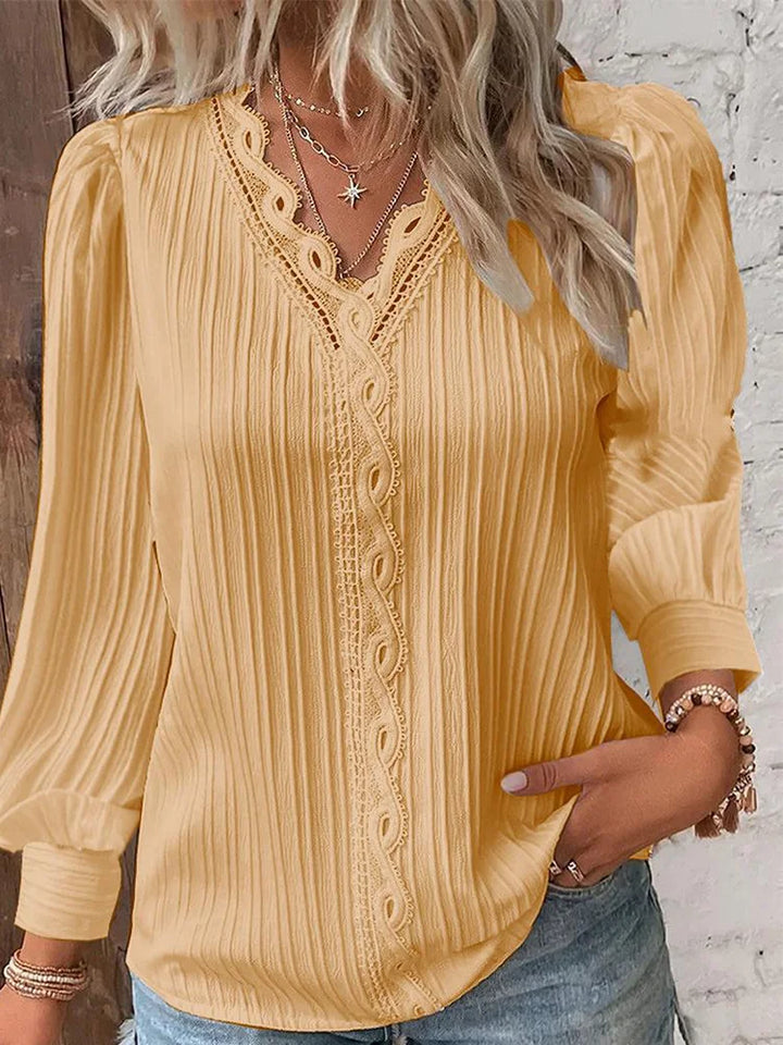 Elegant long sleeve blouse with lace details for women