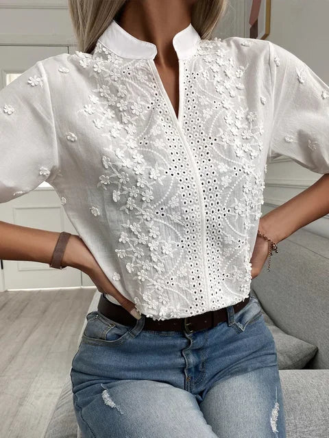 Casual white blouse with embroidered flowers for women