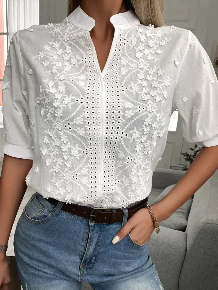 Casual white blouse with embroidered flowers for women