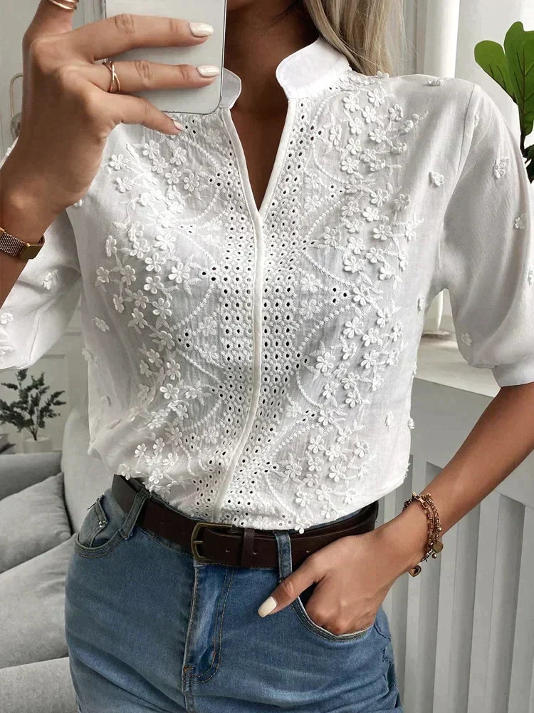 Casual white blouse with embroidered flowers for women