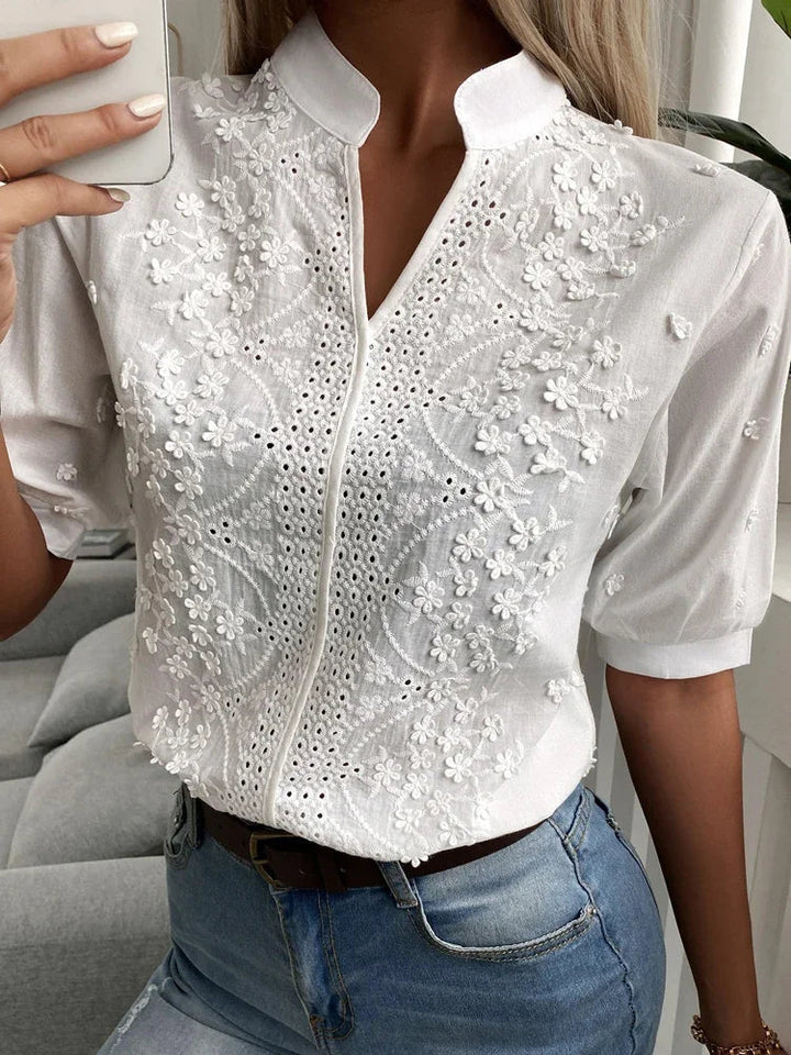 Casual white blouse with embroidered flowers for women